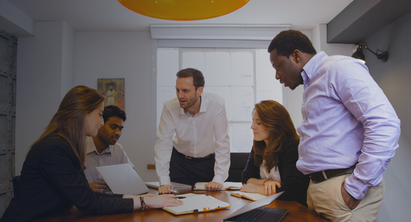 Turnkey Consulting employees discussing risk management